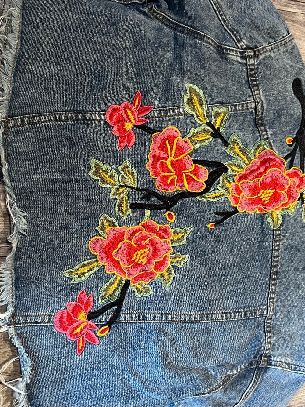 Sunset and Spring denim jacket with floral embroidery